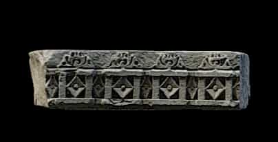 Broken carved beam 